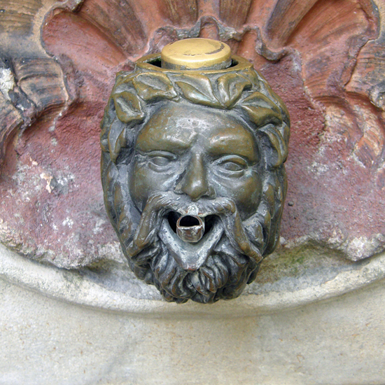 Drinking fountain in the shape of a satyr's head