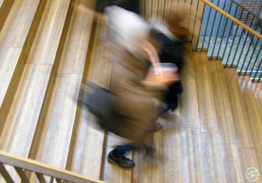 Figures descending a staircase