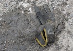 Worker's glove with yellow band, Hisingsgatan, Gothenburg, Sweden 9 Mar '11 08.33