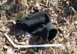 Black woolen glove with straw Hjalmar Brantingsgatan, Gothenburg, Sweden 8 Mar '11 12.08