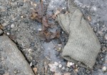 Glove in gutter at Virvelvindsgatan, Gothenburg, Sweden 9 Mar '11