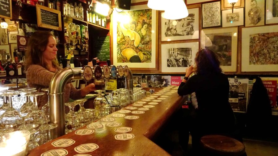 Maastricht: The bar and barmaid at Café de Pieter, Pieterstraat