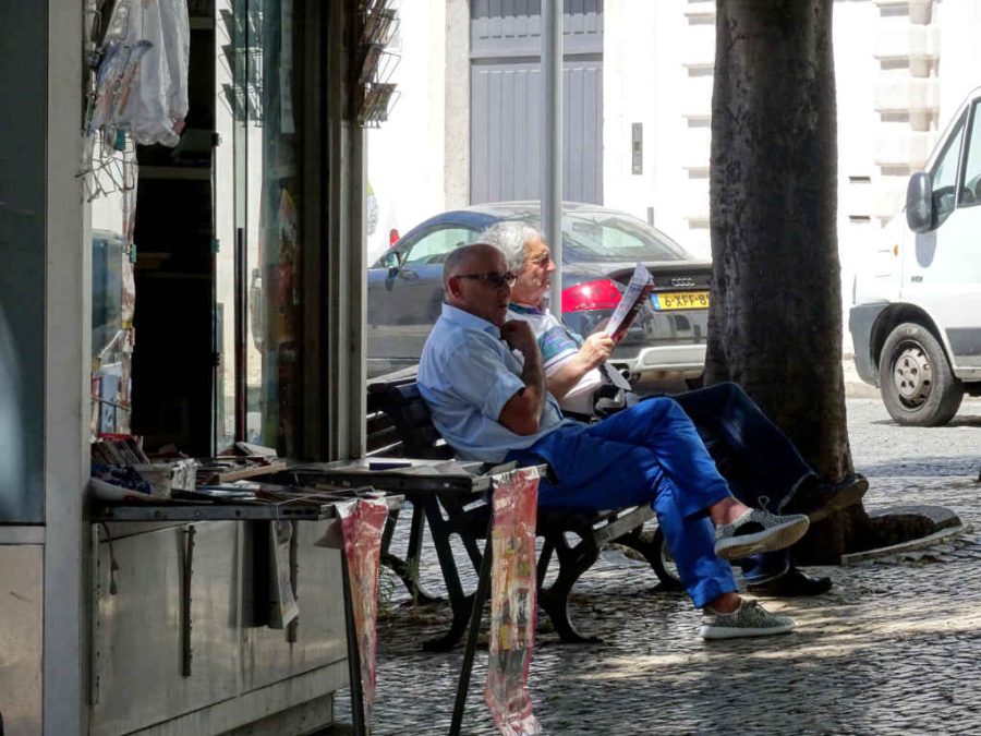 Wednesday - Bairro Alto, Lisbon - street scene - reading the news
