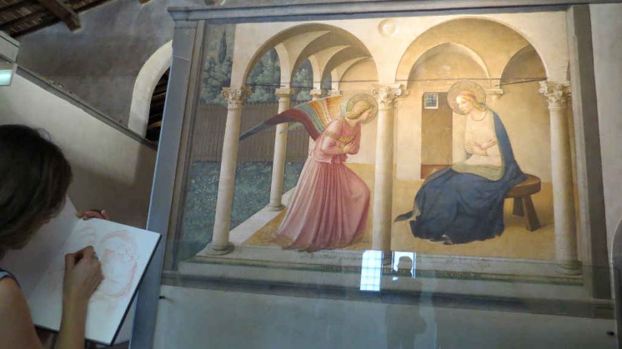 Art student sketching Fra Angelico's Annunciation at San Marco