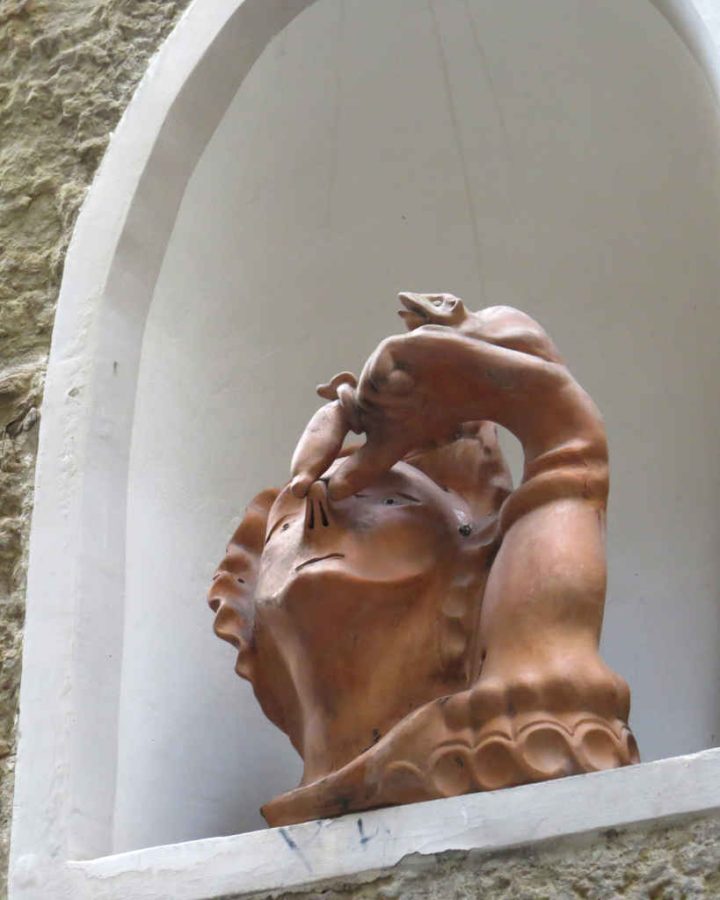 Woman holding her nose