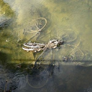 Brief return: Bicycles in the stream at Leuven