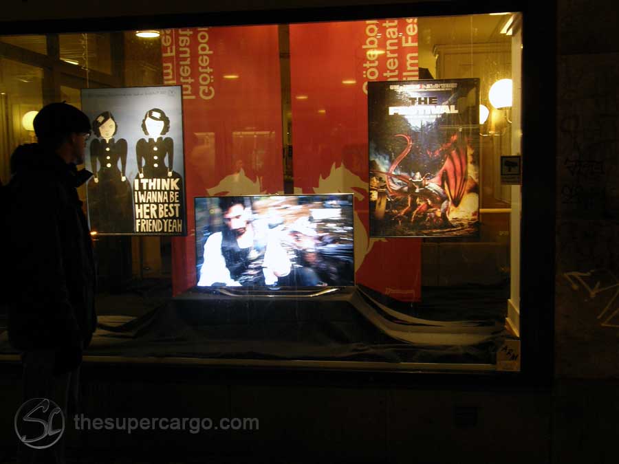 An illuminated display advertising the 2013 Gothenburg International Film Festival in the window of the public transport ticket office at Brunnsparken in the centre of town.