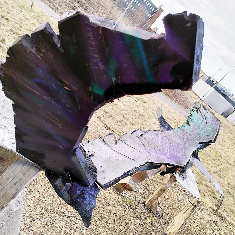Sculpture of a purple raven, or a crow perhaps