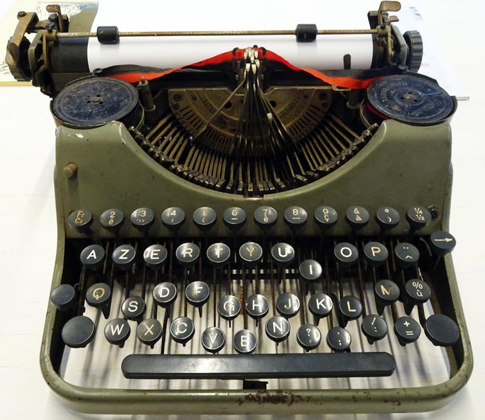 An old manual typewriter, the keys are jammed.